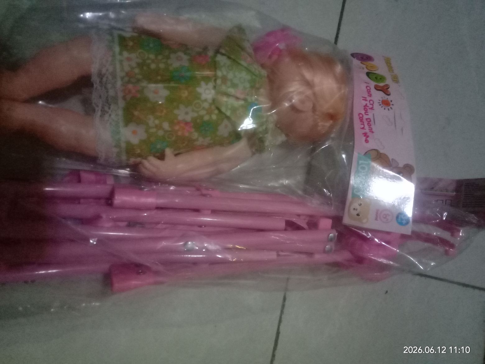 Foto iklan Mainan boneka nangis+troller 2